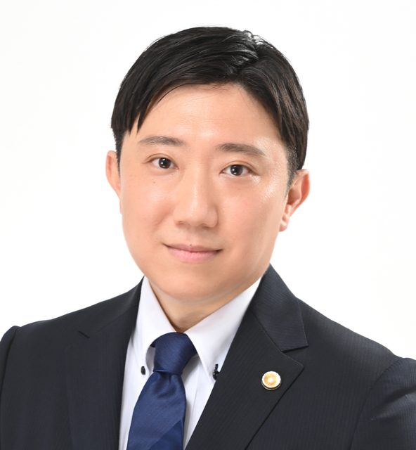 代表弁護士 岡田忠智